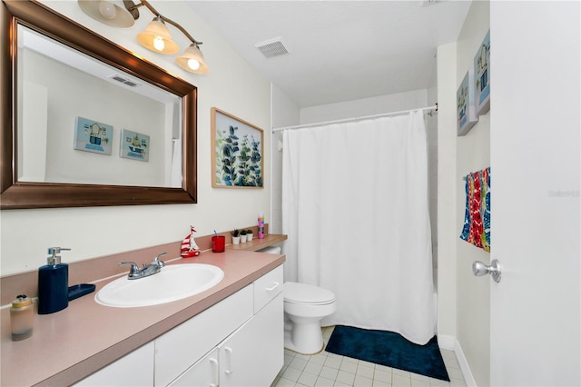 5566 Metrowest Blvd Unit 10, Orlando, FL 32811 - bathroom featuring vanity, tile patterned floors, and a shower with shower curtain