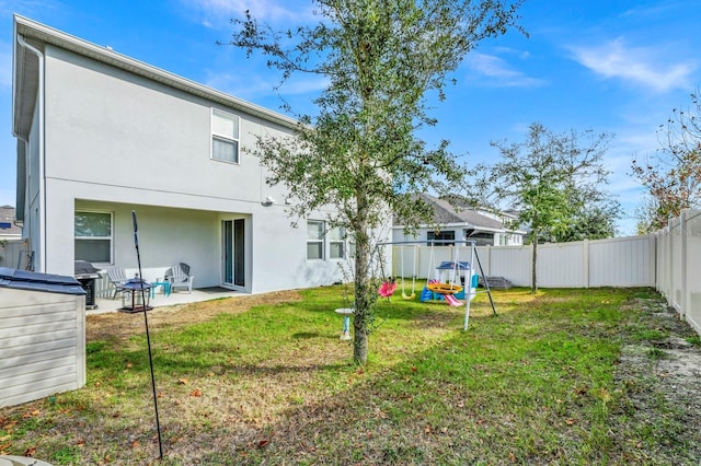 609 Big Pine Ave, Minneola, FL 34715 - fenced backyard with a patio