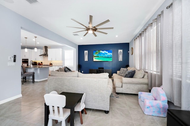 609 Big Pine Ave, Minneola, FL 34715 - living room with a ceiling fan and light tile patterned flooring