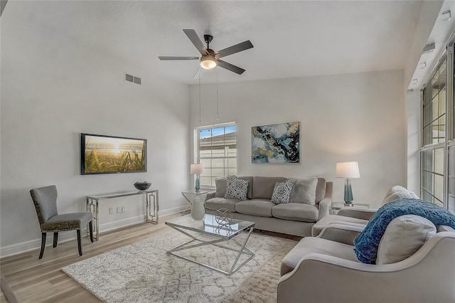 1921 Heathwood Dr, Winter Park, FL 32792 - living room featuring ceiling fan, light wood-style flooring, and high vaulted ceiling