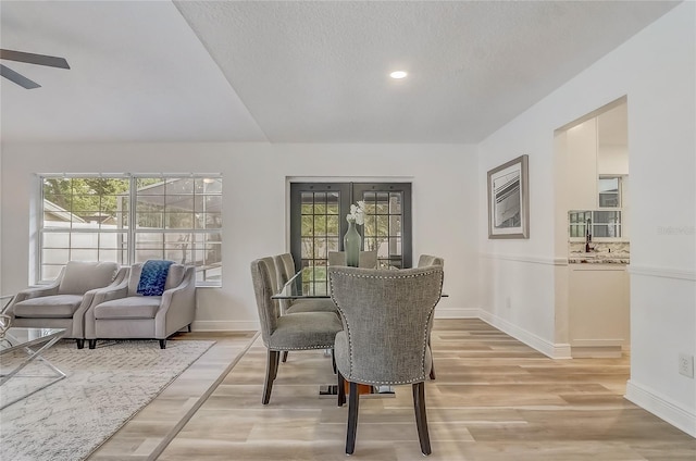 1921 Heathwood Dr, Winter Park, FL 32792 - dining area featuring healthy amount of natural light, light wood-style flooring, ceiling fan, and recessed lighting