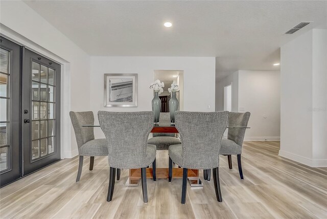 1921 Heathwood Dr, Winter Park, FL 32792 - dining space featuring french doors and wood finished floors