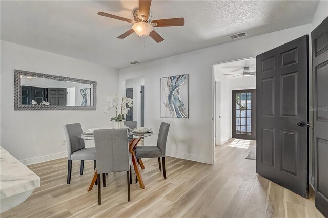 1921 Heathwood Dr, Winter Park, FL 32792 - dining room with ceiling fan and light wood finished floors
