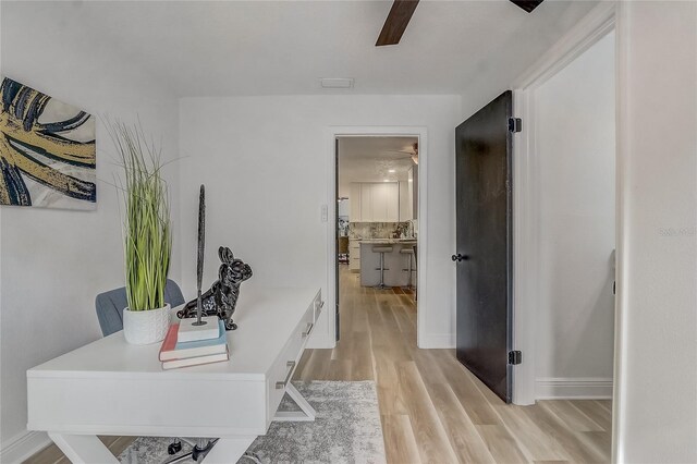 1921 Heathwood Dr, Winter Park, FL 32792 - home office with ceiling fan and light wood finished floors