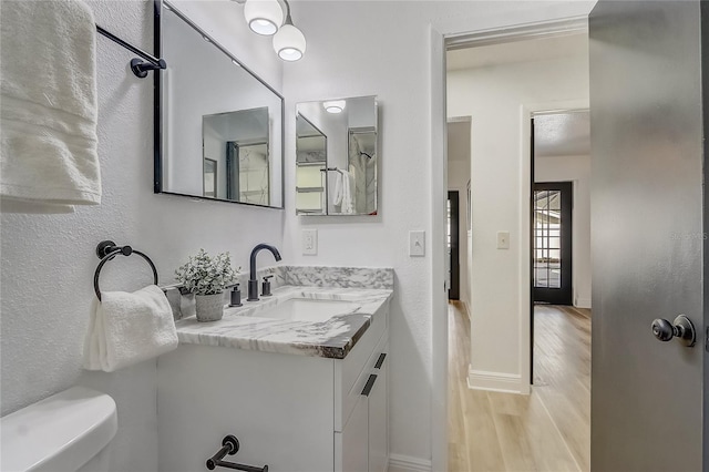 1921 Heathwood Dr, Winter Park, FL 32792 - bathroom with wood finished floors and vanity