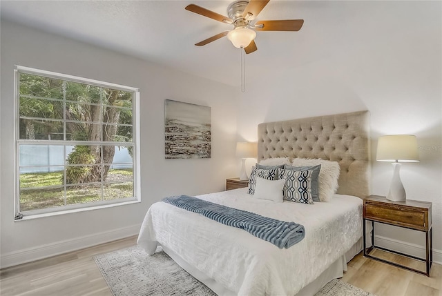 1921 Heathwood Dr, Winter Park, FL 32792 - bedroom featuring wood finished floors and a ceiling fan