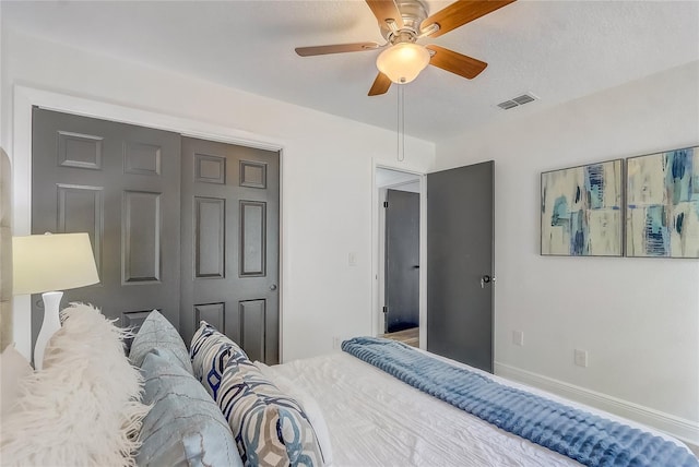 1921 Heathwood Dr, Winter Park, FL 32792 - bedroom with a ceiling fan and a closet