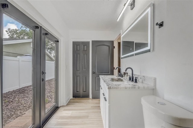 1921 Heathwood Dr, Winter Park, FL 32792 - bathroom featuring vanity and wood finished floors