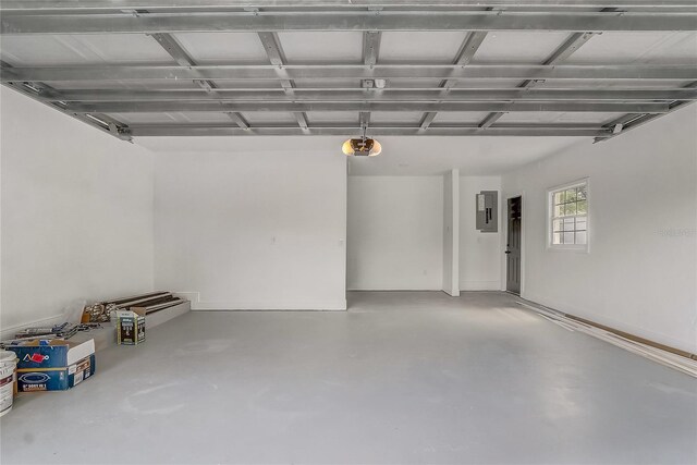 1921 Heathwood Dr, Winter Park, FL 32792 - garage with electric panel and a garage door opener
