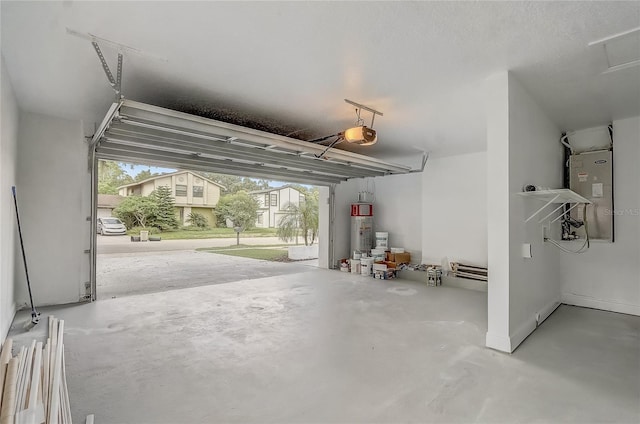 1921 Heathwood Dr, Winter Park, FL 32792 - garage with secured water heater and a garage door opener