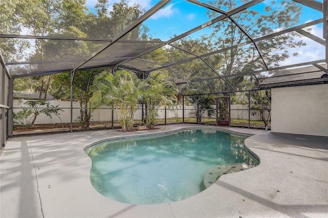 1921 Heathwood Dr, Winter Park, FL 32792 - view of pool with a patio area, a fenced backyard, and glass enclosure