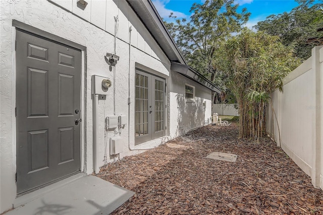 1921 Heathwood Dr, Winter Park, FL 32792 - entrance to property with stucco siding and french doors