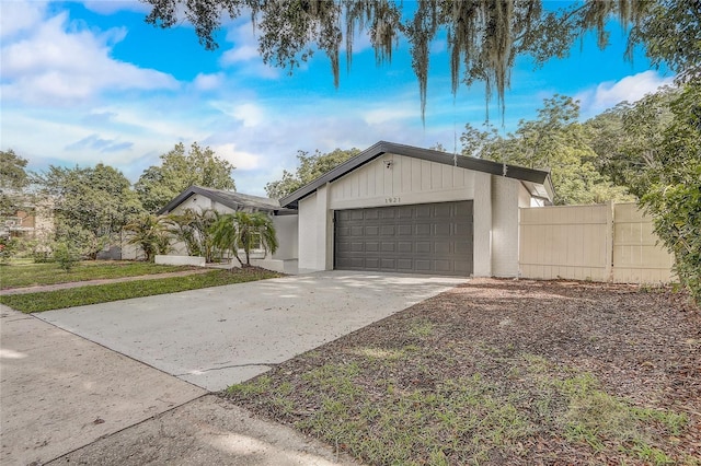 1921 Heathwood Dr, Winter Park, FL 32792 - garage featuring driveway