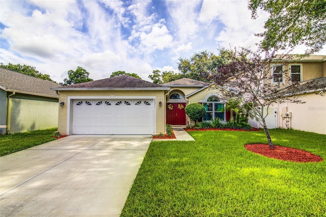2031 Wekiva Reserve Blvd, Apopka, FL 32703 - single story home with driveway, stucco siding, an attached garage, and a front yard