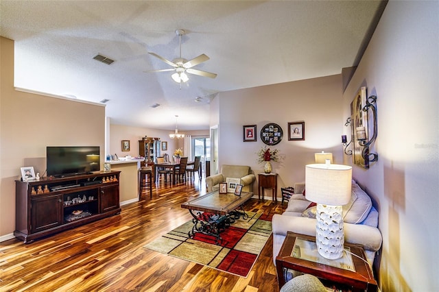 2031 Wekiva Reserve Blvd, Apopka, FL 32703 - living area featuring wood finished floors, a ceiling fan, and a chandelier