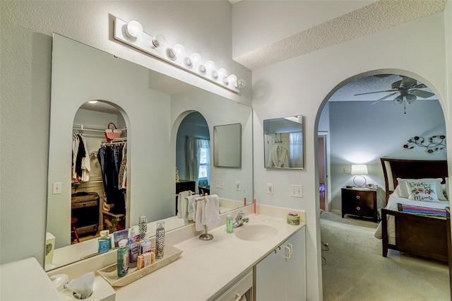 2031 Wekiva Reserve Blvd, Apopka, FL 32703 - full bathroom with a ceiling fan, vanity, ensuite bath, and a walk in closet