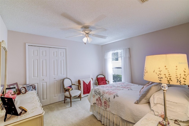 2031 Wekiva Reserve Blvd, Apopka, FL 32703 - bedroom with light colored carpet, a closet, a ceiling fan, and a textured ceiling
