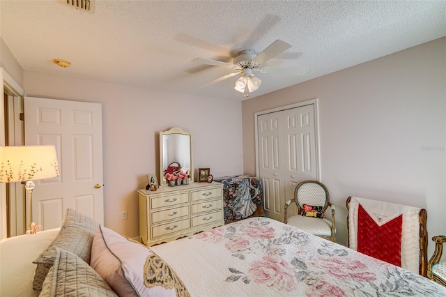 2031 Wekiva Reserve Blvd, Apopka, FL 32703 - bedroom with a closet, a ceiling fan, and a textured ceiling