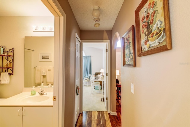 2031 Wekiva Reserve Blvd, Apopka, FL 32703 - hallway featuring dark wood-type flooring and a textured ceiling