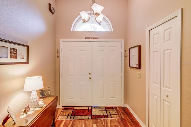 2031 Wekiva Reserve Blvd, Apopka, FL 32703 - entrance foyer featuring wood finished floors and a chandelier
