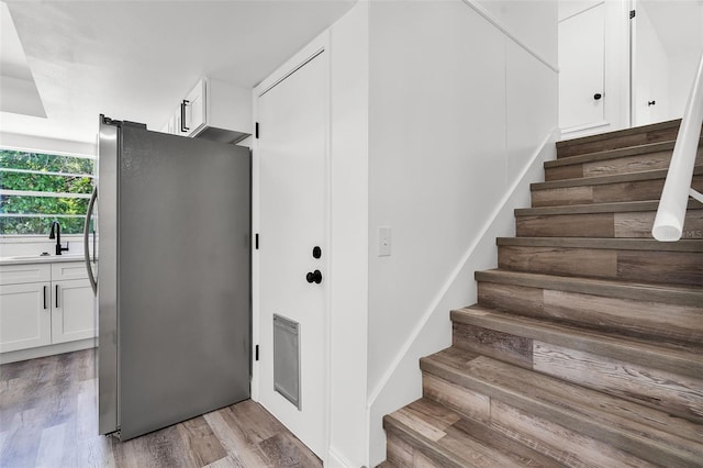608 Pearl Rd, Winter Springs, FL 32708 - stairs with wood finished floors
