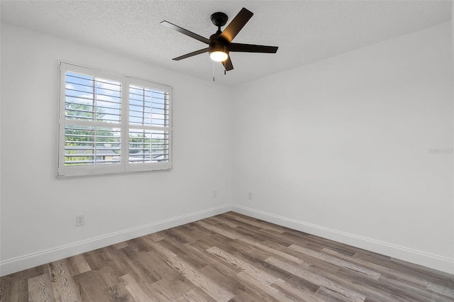 608 Pearl Rd, Winter Springs, FL 32708 - spare room featuring wood finished floors and a ceiling fan