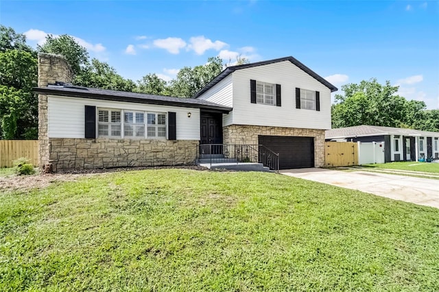 608 Pearl Rd, Winter Springs, FL 32708 - tri-level home with stone siding, concrete driveway, a garage, and a chimney