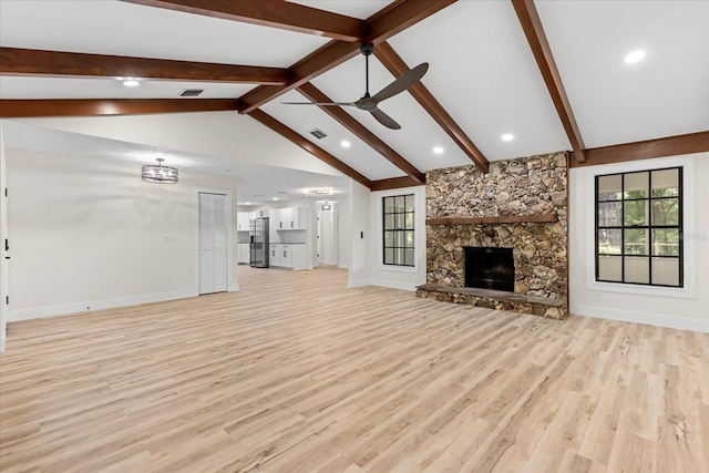 643 Princewood Dr, Deland, FL 32724 - unfurnished living room with light wood-style flooring, a stone fireplace, a ceiling fan, and recessed lighting