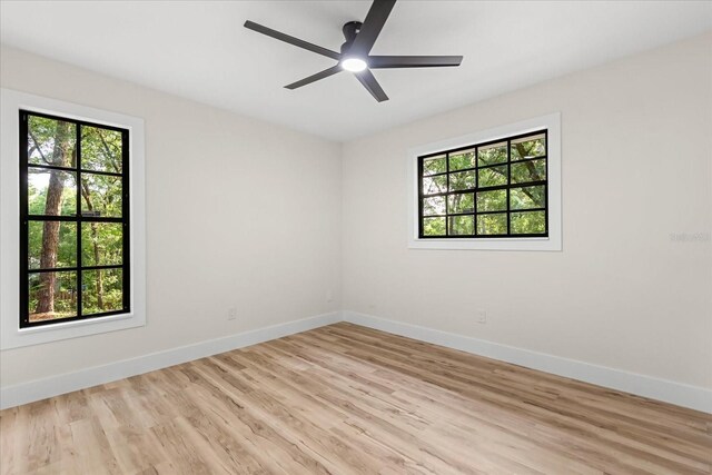 643 Princewood Dr, Deland, FL 32724 - spare room with plenty of natural light, light wood-style floors, and ceiling fan