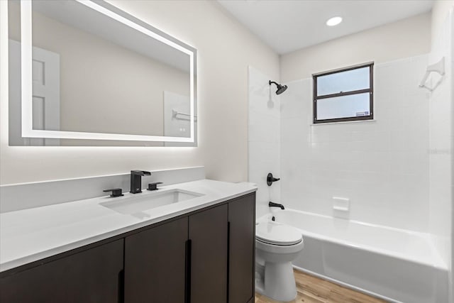 643 Princewood Dr, Deland, FL 32724 - full bath featuring vanity, wood finished floors, and bathtub / shower combination