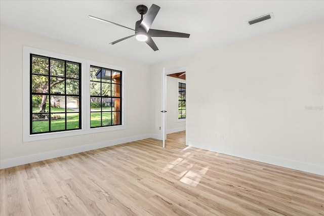 643 Princewood Dr, Deland, FL 32724 - empty room featuring healthy amount of natural light, light wood-style floors, and a ceiling fan