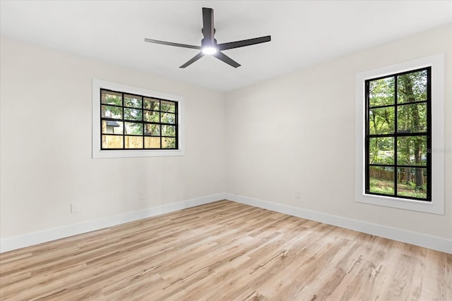 643 Princewood Dr, Deland, FL 32724 - empty room with plenty of natural light, light wood finished floors, and a ceiling fan