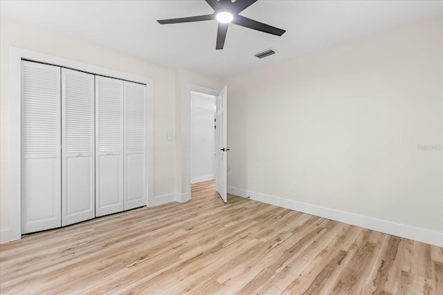 643 Princewood Dr, Deland, FL 32724 - unfurnished bedroom featuring wood finished floors, a closet, and ceiling fan