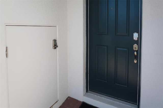 14568 Crestavista Ave, Clermont, FL 34714 - property entrance featuring stucco siding