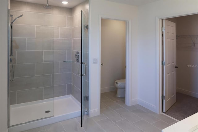 14568 Crestavista Ave, Clermont, FL 34714 - full bath featuring a stall shower, tile patterned flooring, and a spacious closet