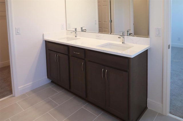 14568 Crestavista Ave, Clermont, FL 34714 - bathroom featuring double vanity and tile patterned floors