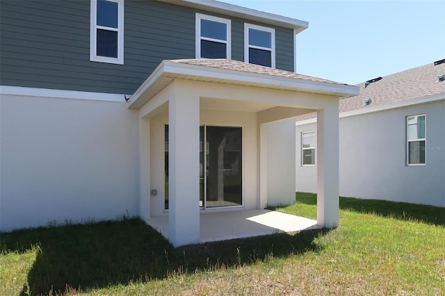14568 Crestavista Ave, Clermont, FL 34714 - rear view of property with a patio, a yard, and stucco siding