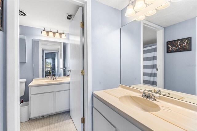 1051 S Highland St Unit 7D, Mount Dora, FL 32757 - full bathroom with vanity and a chandelier