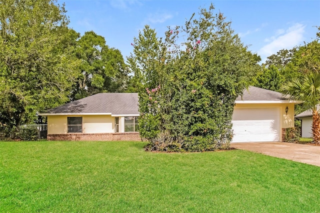 10448 SW 74th Ct, Ocala, FL 34476 - view of front of home with concrete driveway, stucco siding, a front lawn, and a garage