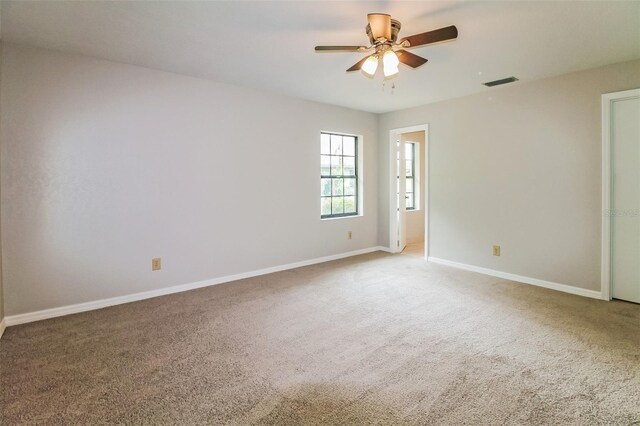 10448 SW 74th Ct, Ocala, FL 34476 - carpeted empty room featuring a ceiling fan and baseboards