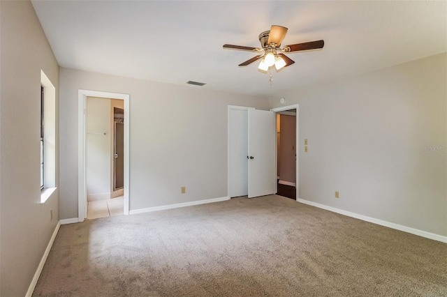 10448 SW 74th Ct, Ocala, FL 34476 - unfurnished bedroom featuring light carpet and a ceiling fan