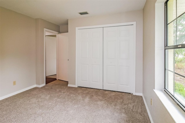 10448 SW 74th Ct, Ocala, FL 34476 - unfurnished bedroom with carpet floors and a closet
