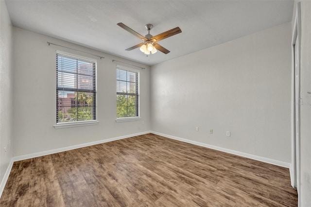 911 N Orange Ave Unit 443, Orlando, FL 32801 - spare room featuring wood finished floors and a ceiling fan