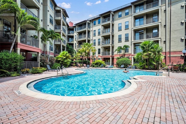 911 N Orange Ave Unit 443, Orlando, FL 32801 - community pool featuring a patio area