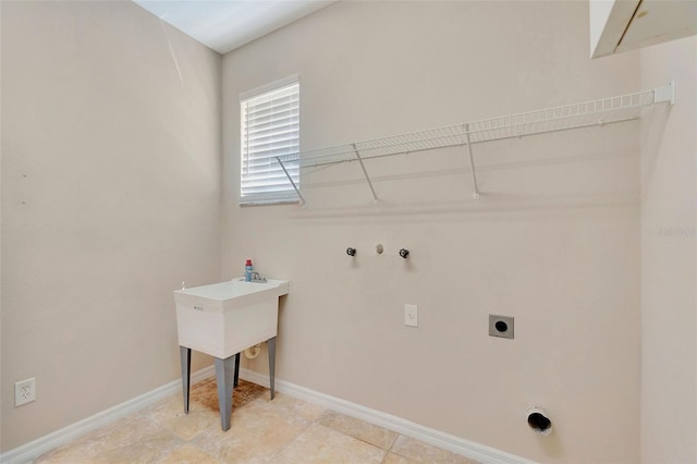 5819 Covington Cove Way, Orlando, FL 32829 - laundry area featuring hookup for an electric dryer and washer hookup