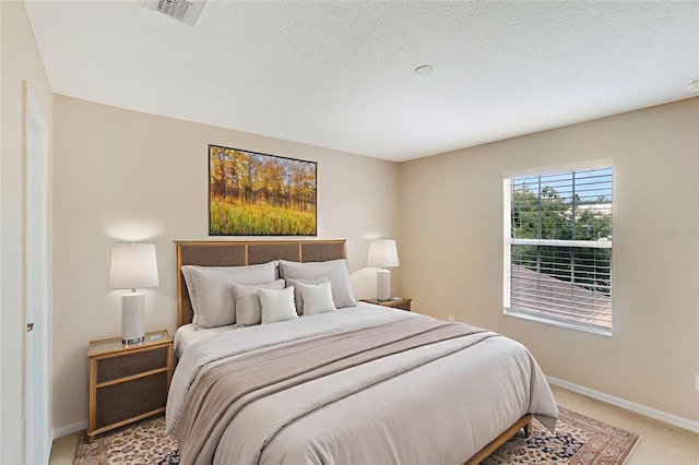 5819 Covington Cove Way, Orlando, FL 32829 - bedroom with light carpet and baseboards
