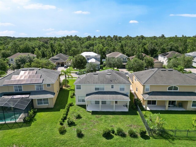 5819 Covington Cove Way, Orlando, FL 32829 - aerial view of residential area with a heavily wooded area