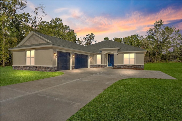12258 SW 76th Ln, Dunnellon, FL 34432 - ranch-style house featuring stone siding, an attached garage, and a lawn