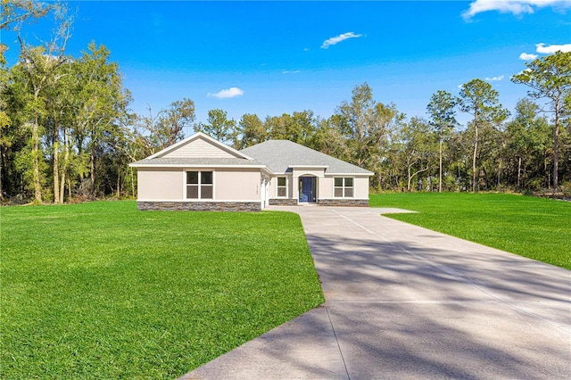 12258 SW 76th Ln, Dunnellon, FL 34432 - ranch-style home featuring stone siding, a front lawn, driveway, and stucco siding