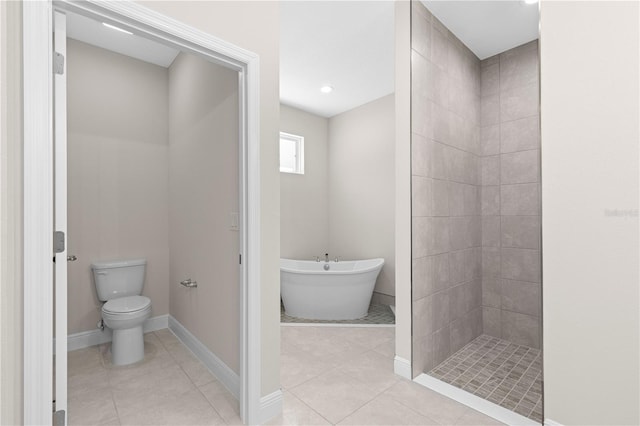 12258 SW 76th Ln, Dunnellon, FL 34432 - bathroom with a soaking tub, tile patterned flooring, and tiled shower